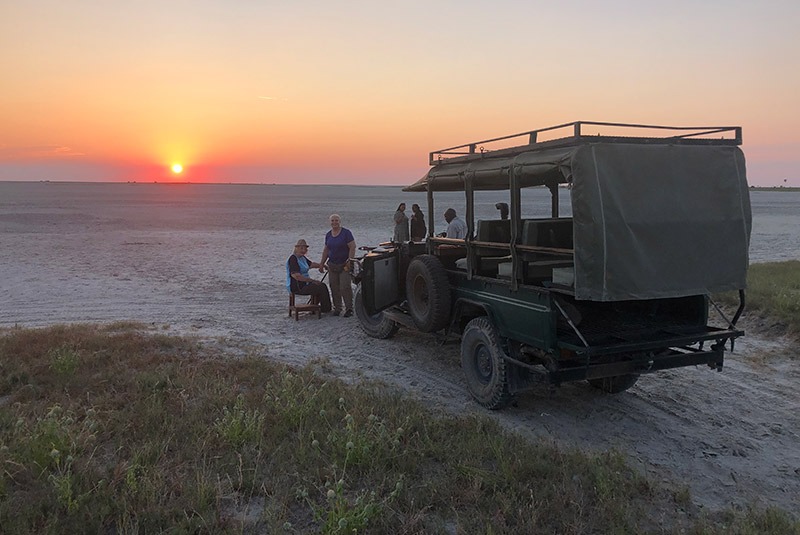 A sundowner from Qorokwe Camp in the Okavango, Botswana