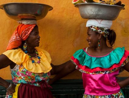 Colorful fruit sellers in Cartagena, Colombia