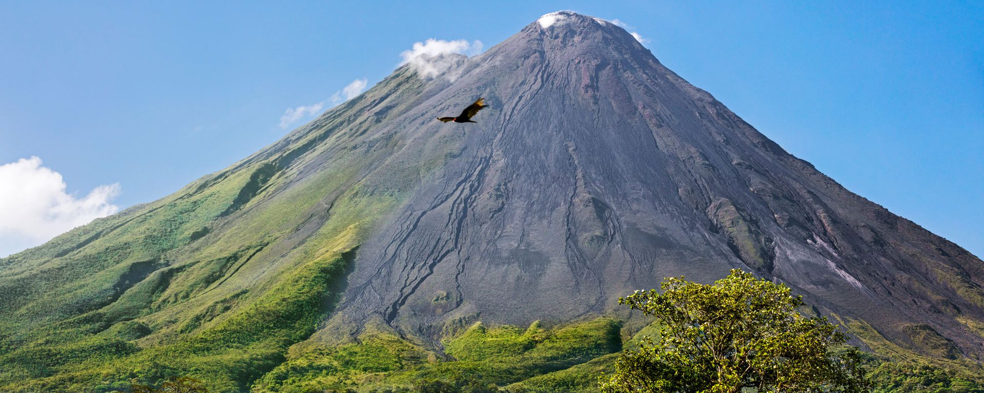 Arenal Volcano with steam rising from its peak, Alajuela Province, Arenal, Costa Rica