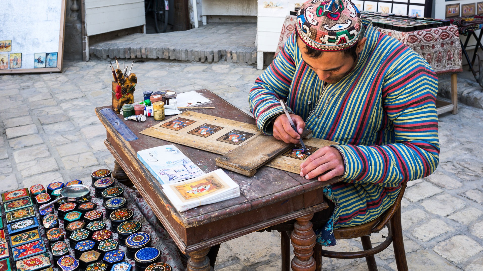 Craftsman at work in the old city center in Bukhara, Uzbekistan