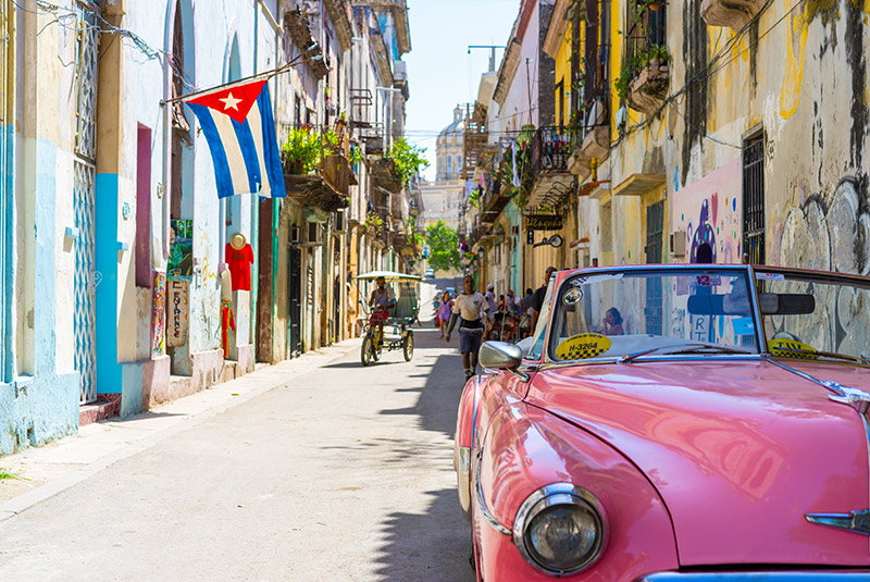 Classic car in a colorful street in old Havana, Cuba