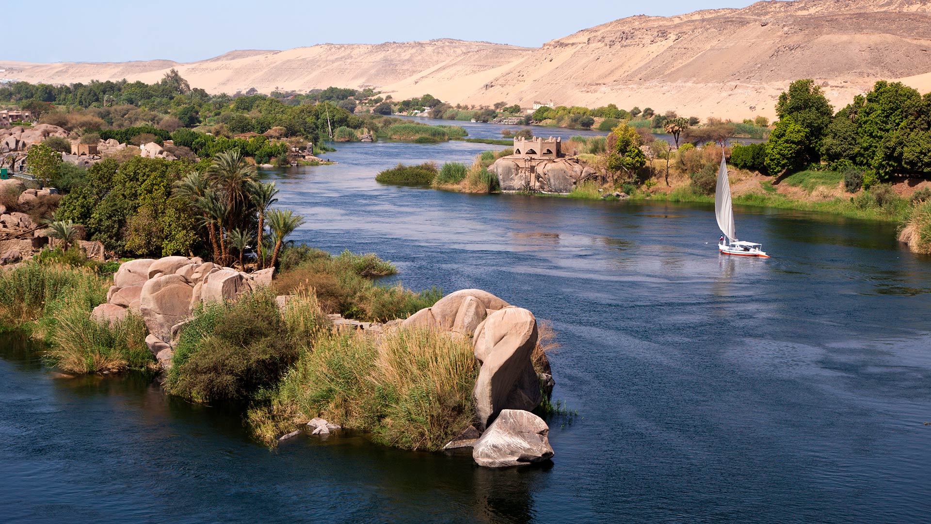 A felucca (wooden sailboat) on the Nile River near Aswan, Egypt