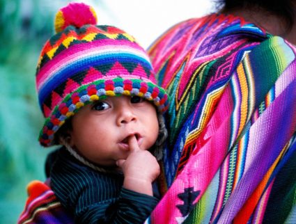 Mother and child in the colorful market town of Chichicastenango, Guatemala