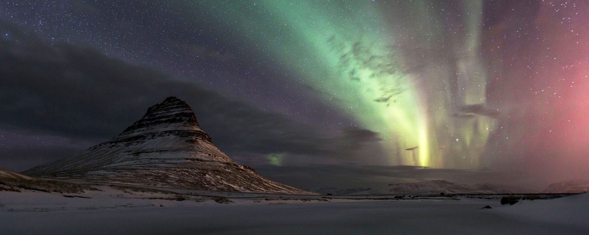 Northern lights above Kirkjufell mountain in western Iceland