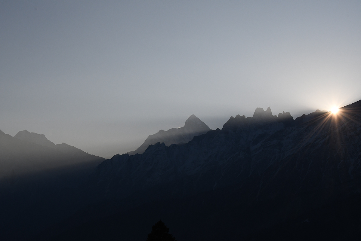 Sun breaks over Nanda Devi and the Himalayas in India