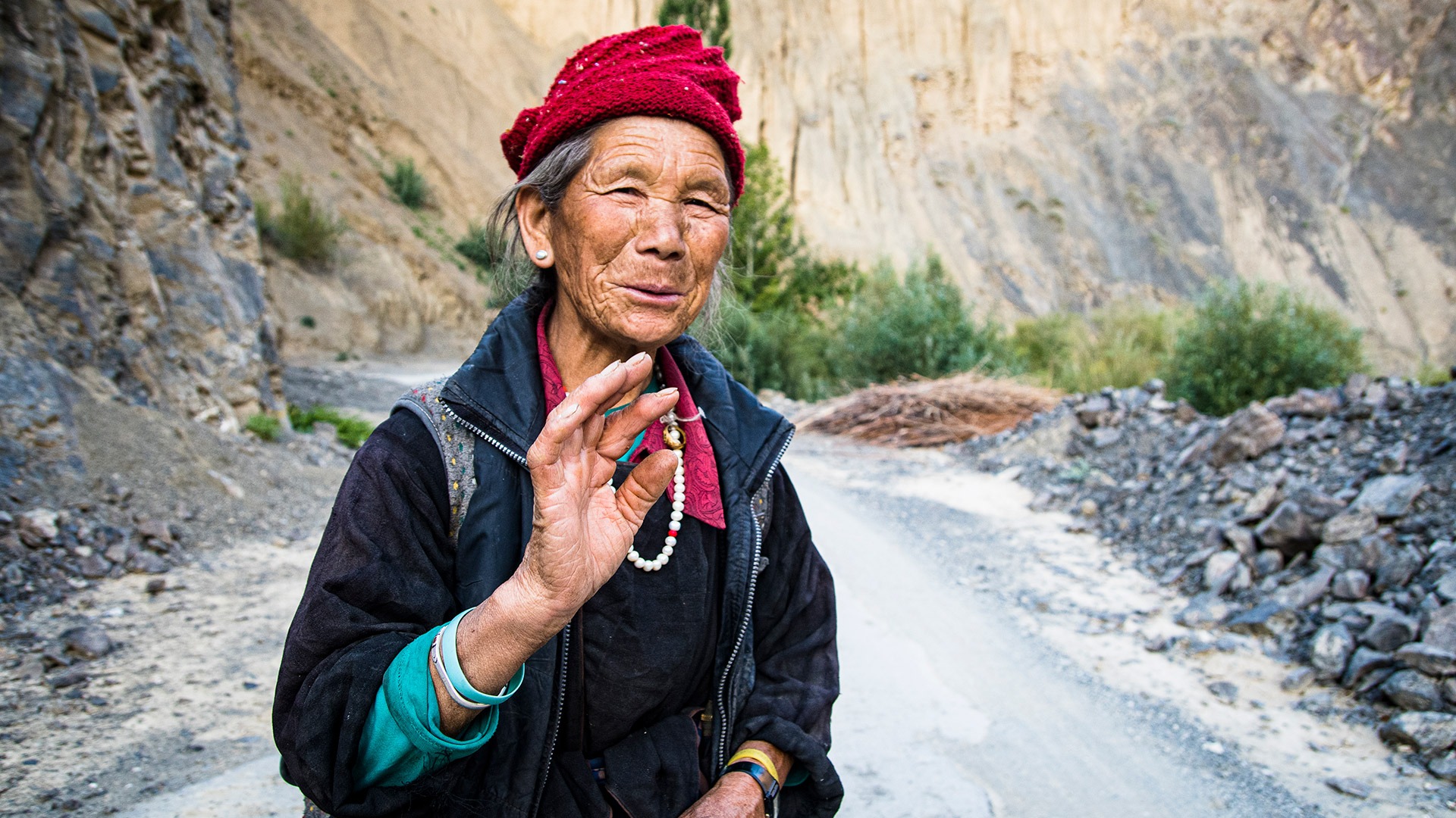 Local woman on Mangyu Gorge road, Ladakh, India