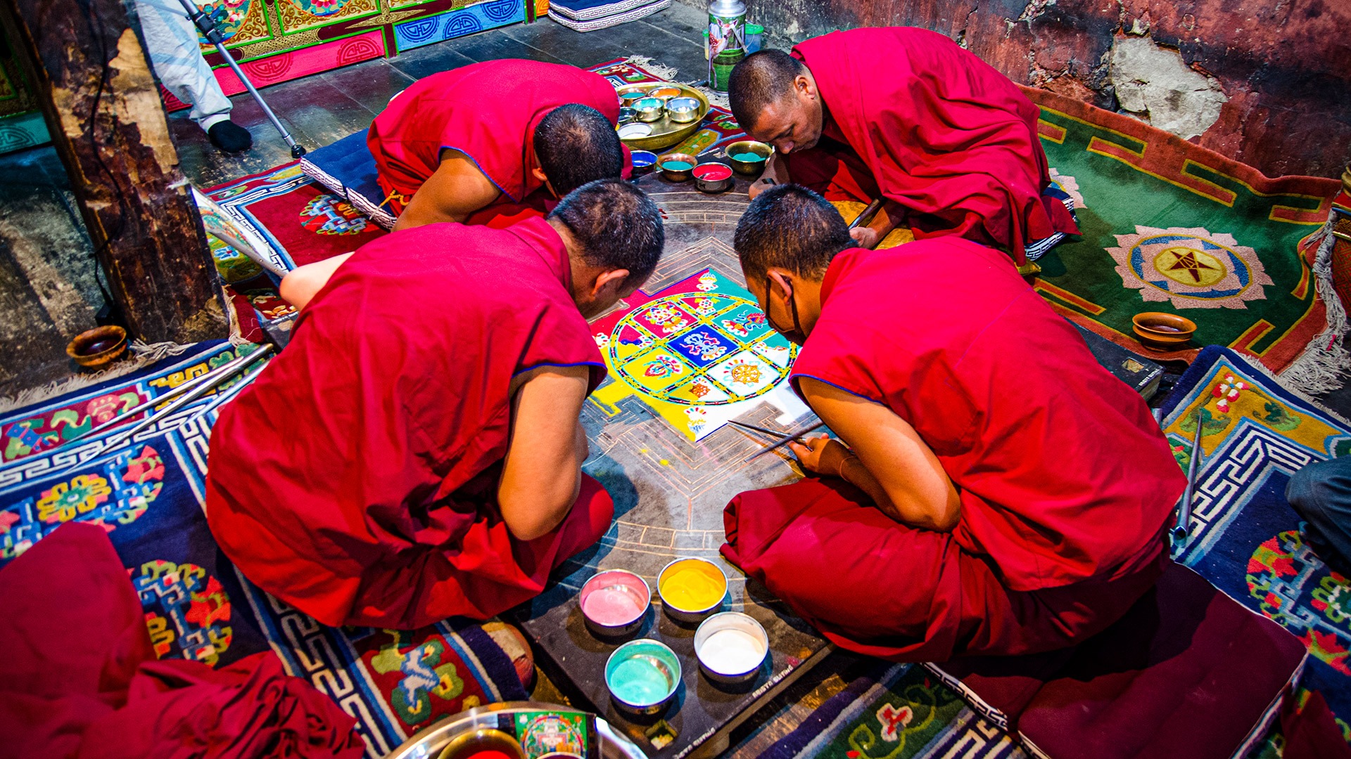 Monks painting a mandala in Ladakh, India