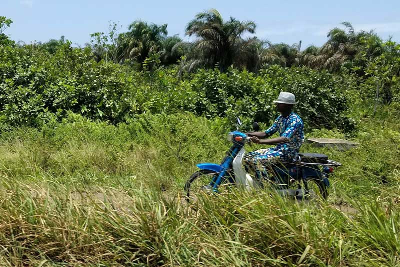 Witness traditional life, man on motorcycle, with GeoEx