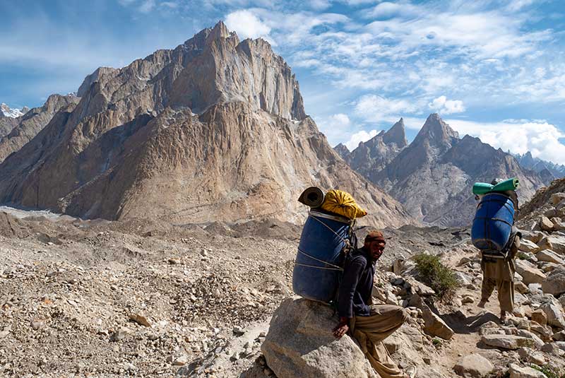 Two porters on the K2 Trek, Pakistan