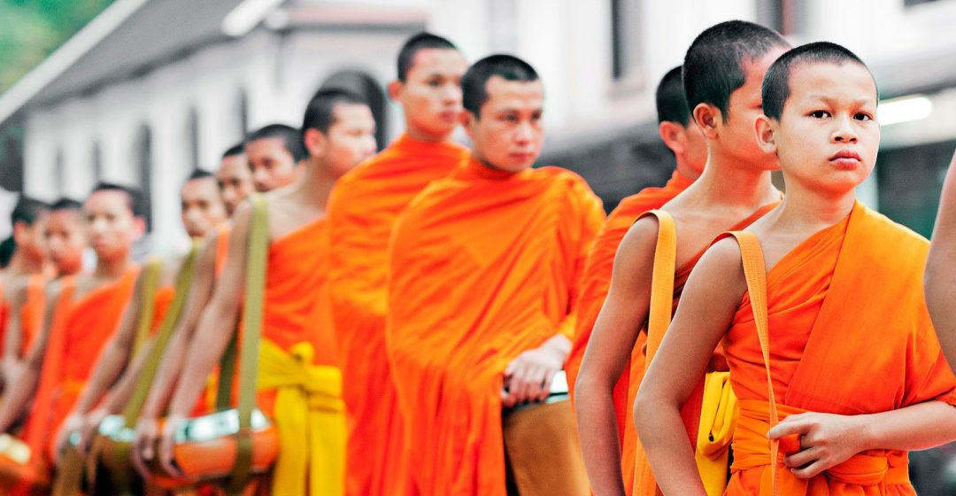 Monks processing for early morning alms in Luang Prabang, Laos