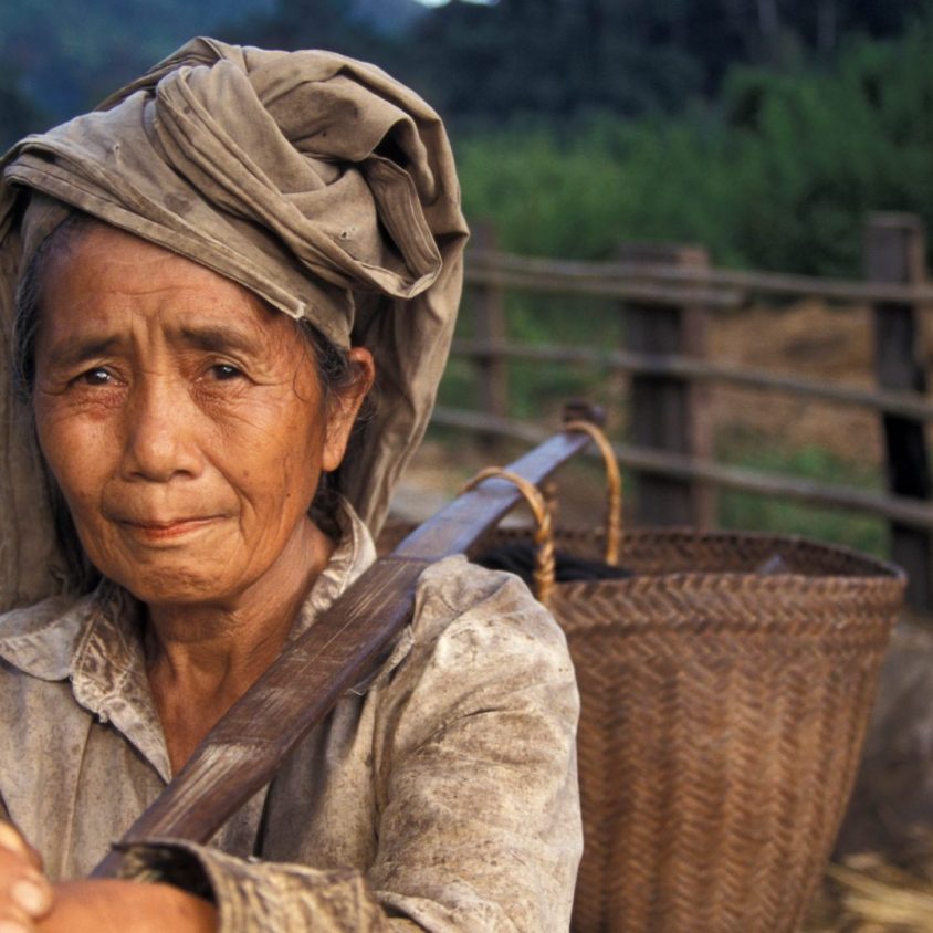 Hmong village woman, Laos with GeoEx