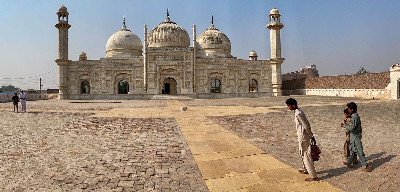 Boys in the courtyard of Abbasi Mosque in Pakistan