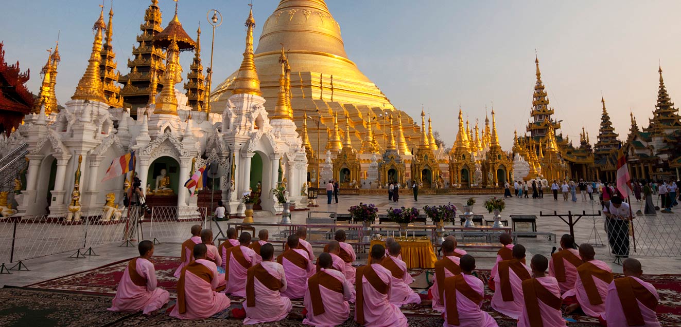 Nuns pray at the Shwedagon Pagoda, Yangon, Myanmar