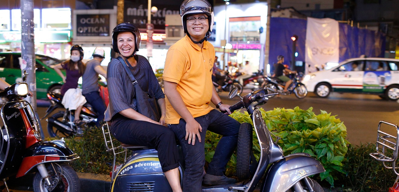 Exploring Vietnam by vespa.