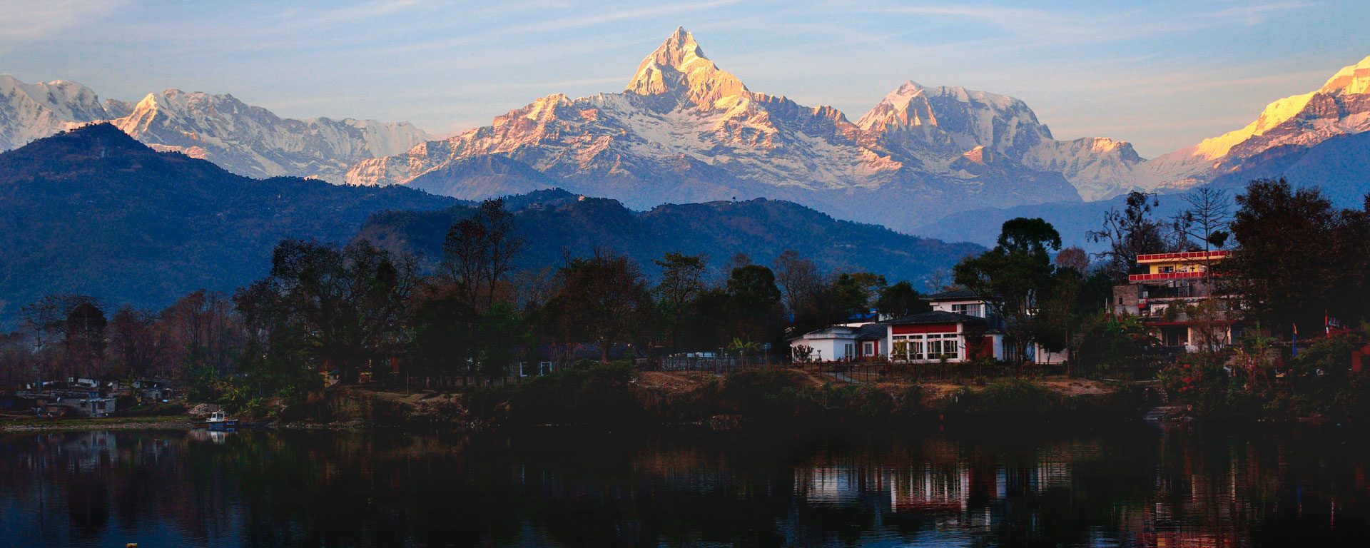 Reflections of the Annapurna Range in Phewa Lake at sunset, Pokhara, Nepal