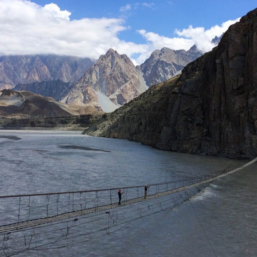 Crossing the Husseini Bridge in the Hunza Valley, Pakistan