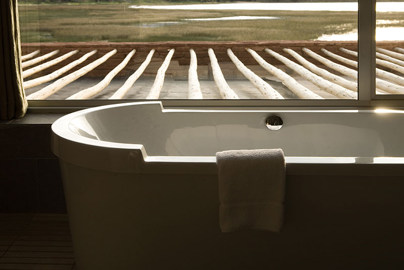 Titilaka bathtub with a view of Lake Titicaca, Peru