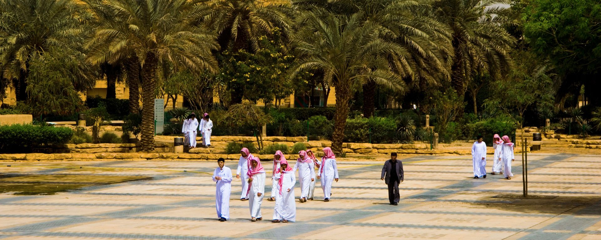 A group of students in the square in front at the National Museum, Riyad, Saudi Arabia