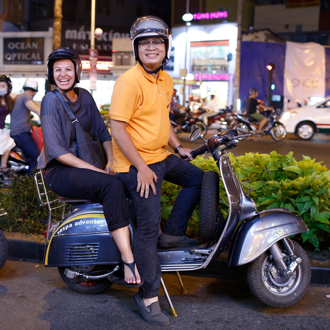 Exploring Vietnam by vespa.