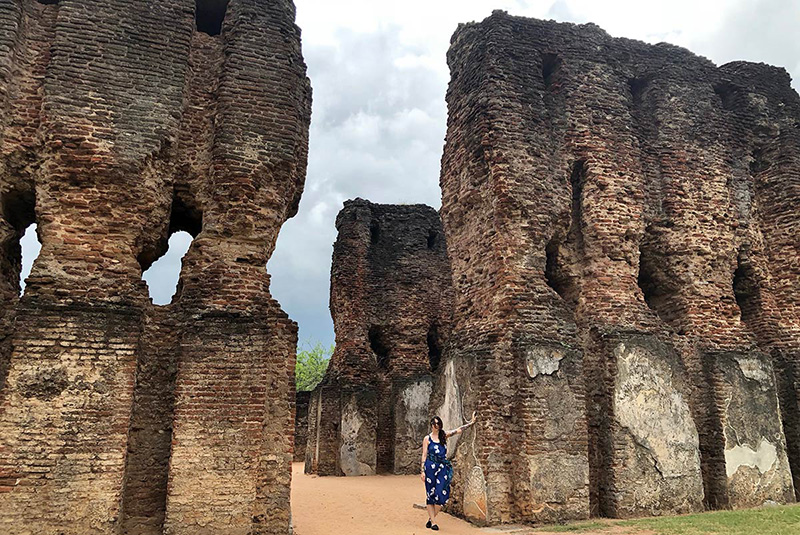 GeoEx staffer Alysa Pakkidis at Polonnaruwa ruins, Sri Lanka