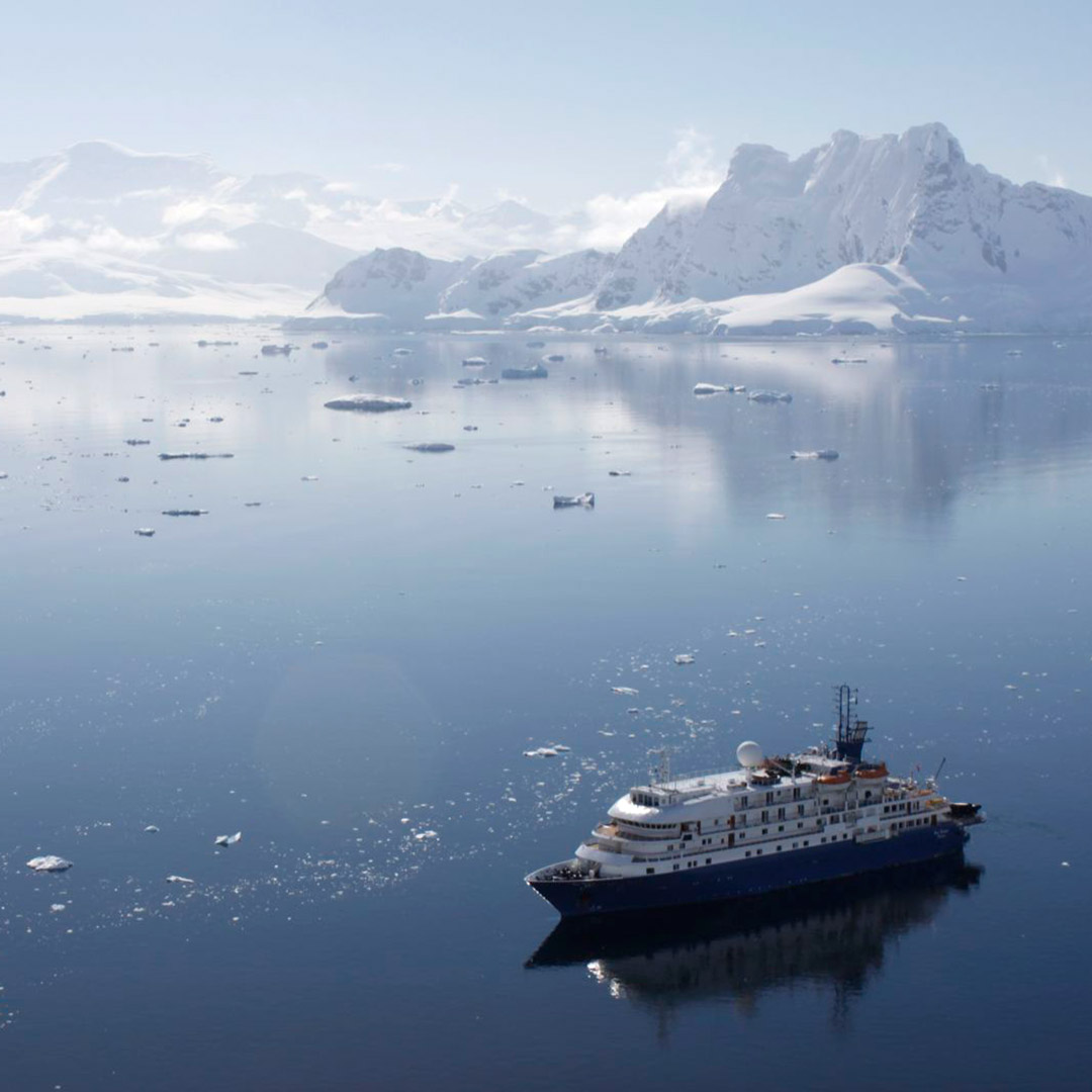 A cruise ship in the waters of Antarctica