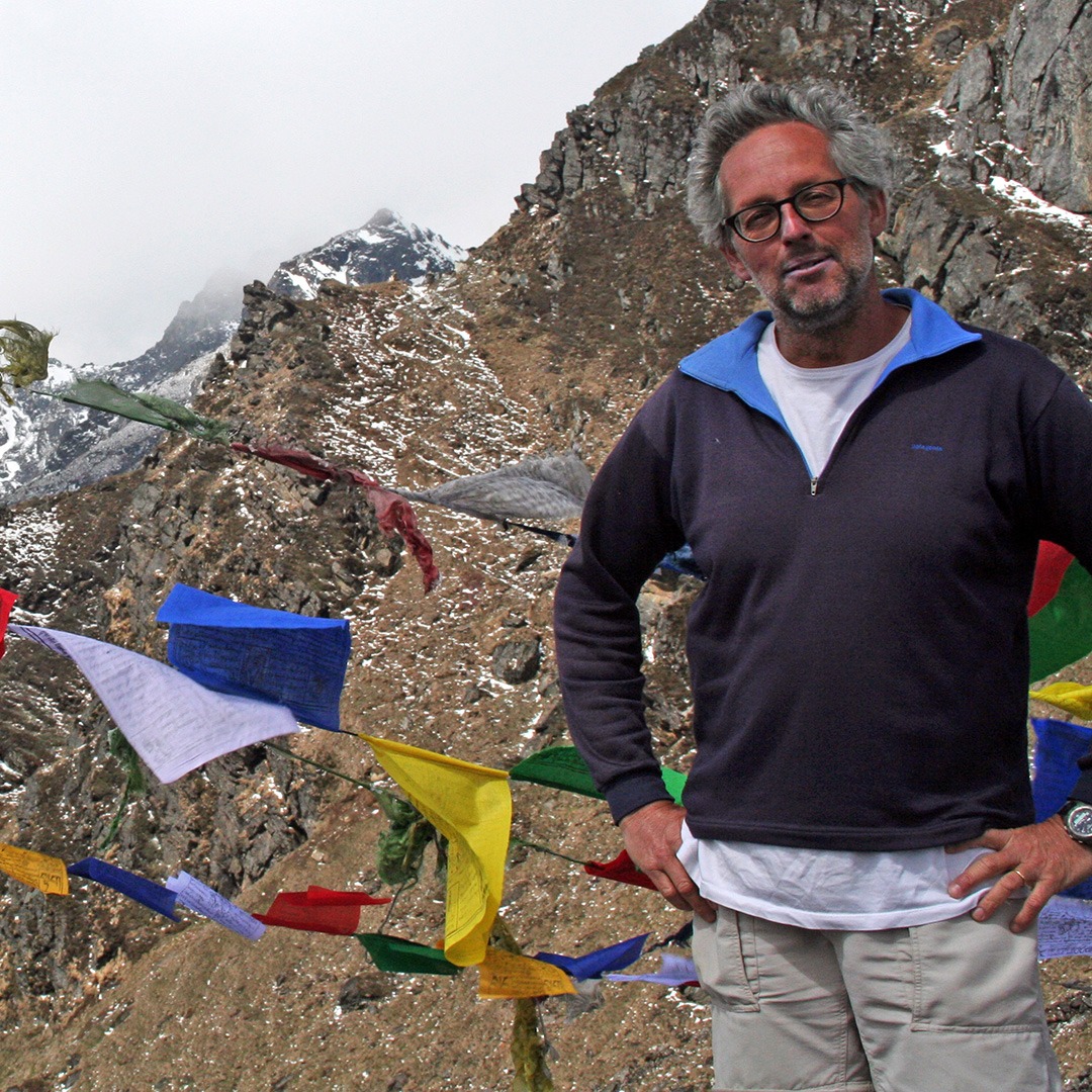 GeoEx Trek Leader Bart Jordans at Gangkhar Puensuum base camp in Bhutan