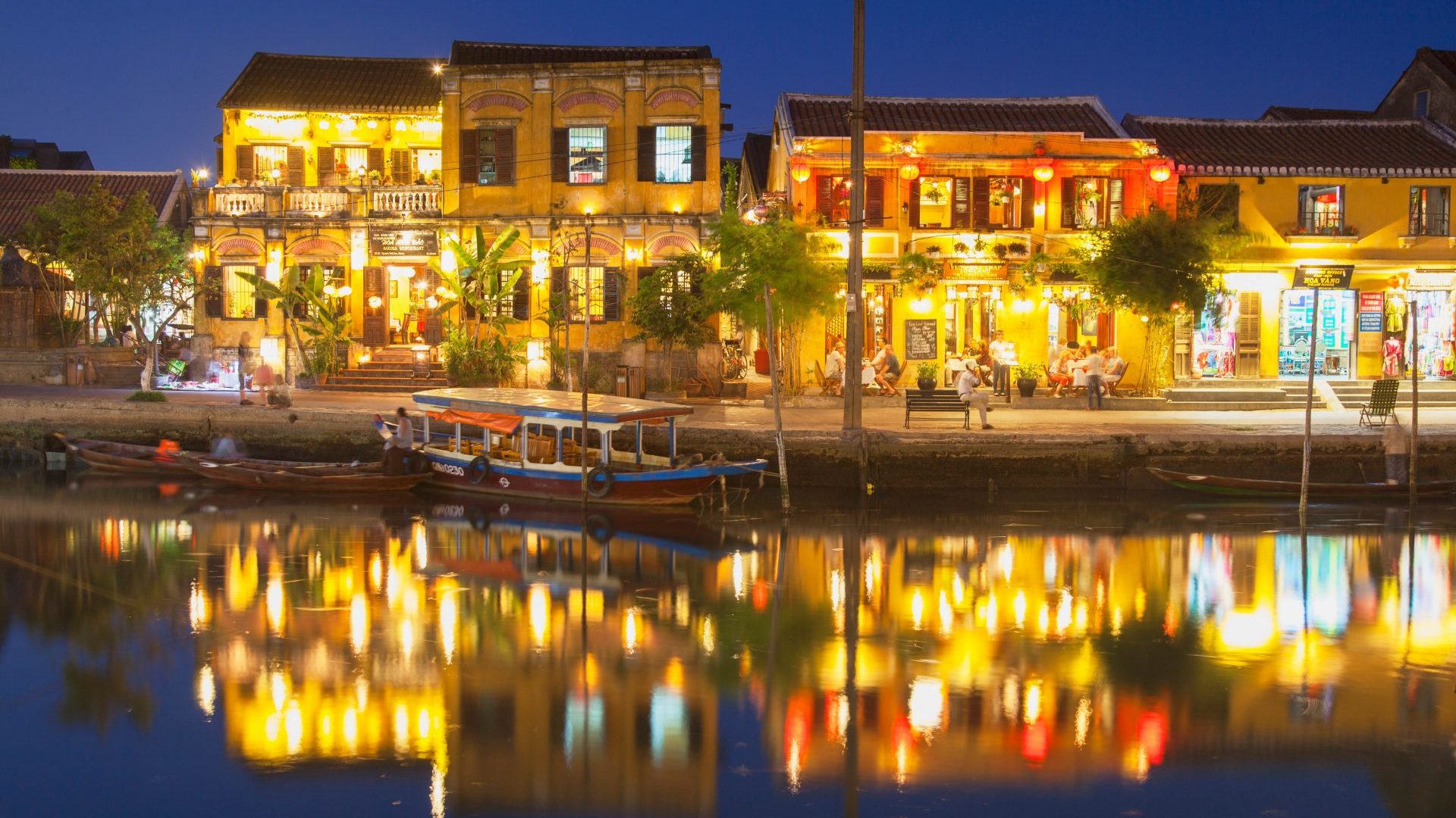 Nightfall on the river in Hoi An, a UNESCO World Heritage Site, in Vietnam with GeoEx