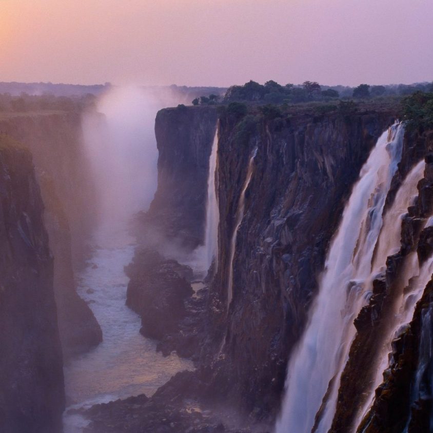 Misty sunrise over Victoria Falls National Park, Zimbabwe